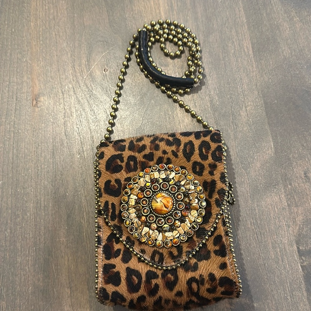 Leather Rock leopard fur small crossbody bag